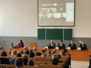 People sitting in a large room