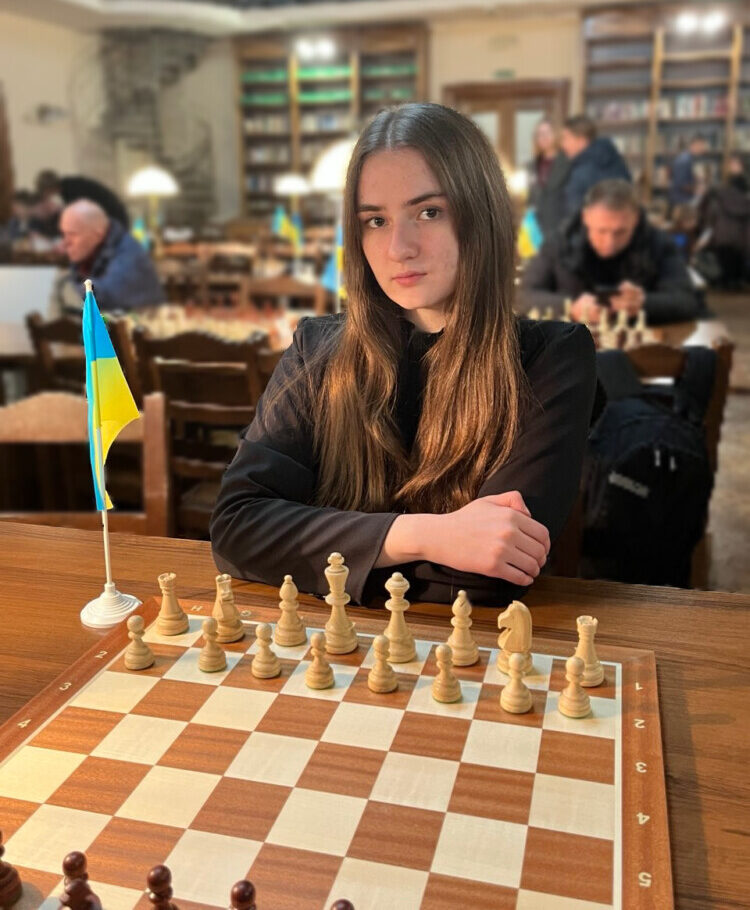 A girl playing chess